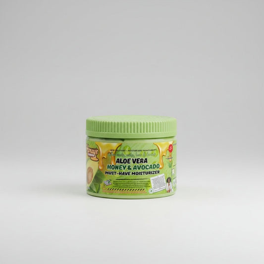 Aloe Vera Moisturizer in a clear pump bottle with fresh aloe leaves background